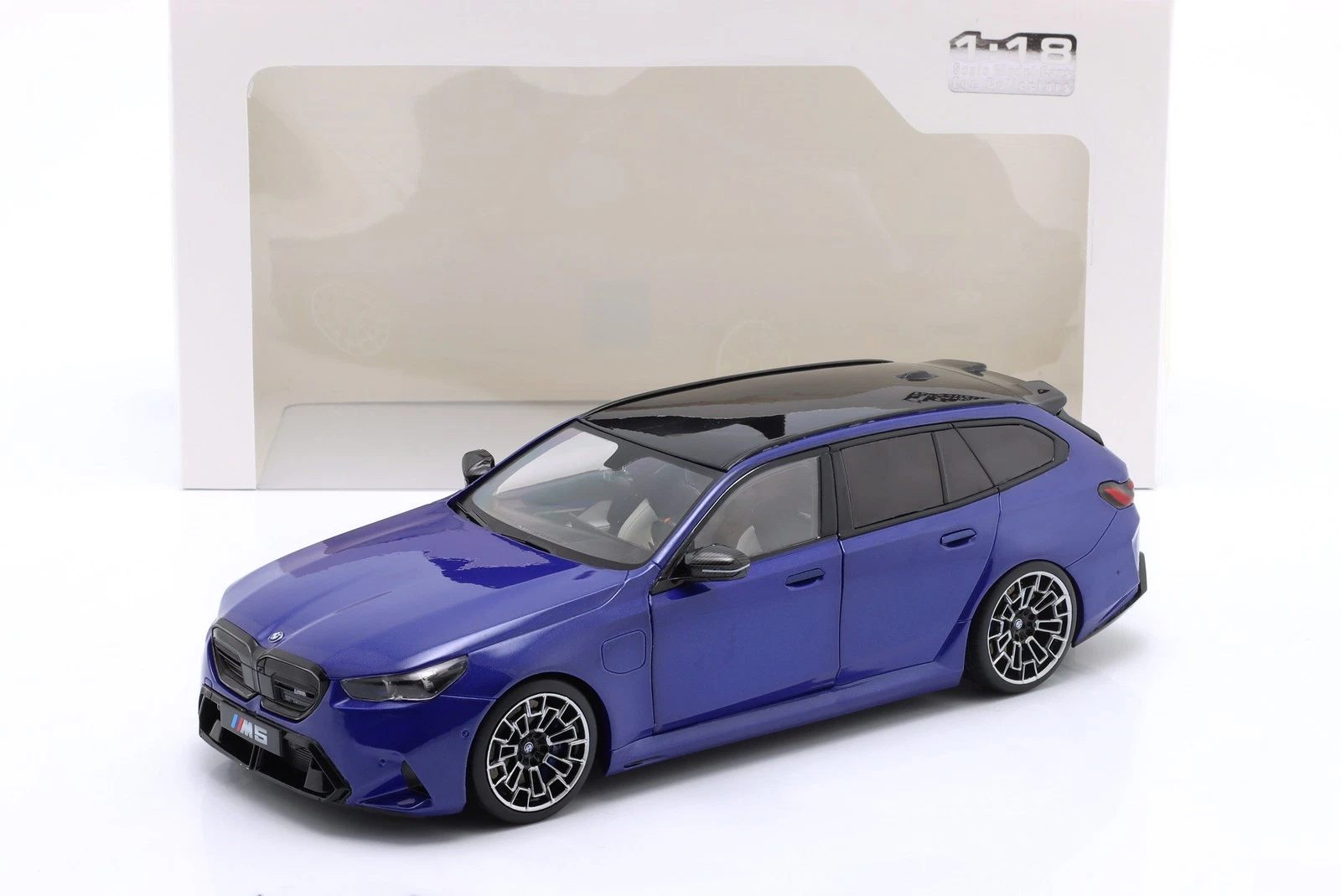 BMW M5 Touring M - 2024, marina bay blue metallic Solido 1:18